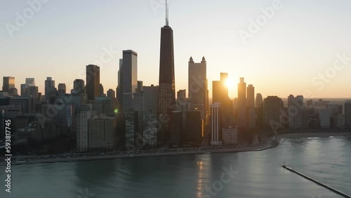 Sunset between skyscrapers in Streeterville, downtown Chicago, USA - Aerial view photo