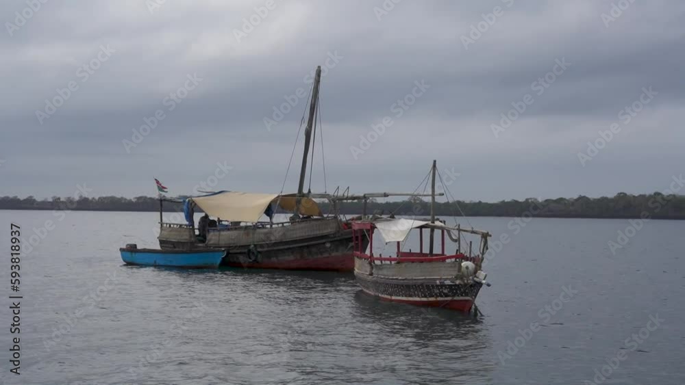 Two Dhow Boats anchored off coast of Kenya Two Dhow Boats anchored off coast of Kenya