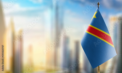 A small Democratic Republic of the Congo flag on an abstract blurry background