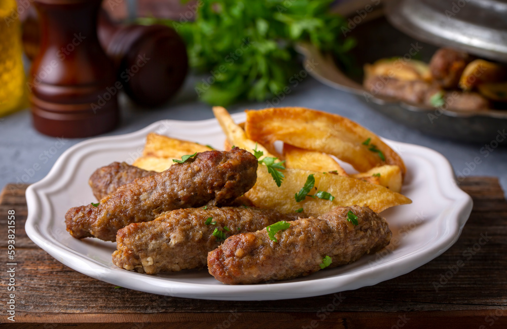 Traditional Turkish food; dry meatballs or inegöl meatballs with potatoes (Turkish name; Kuru kofte or anne koftesi)