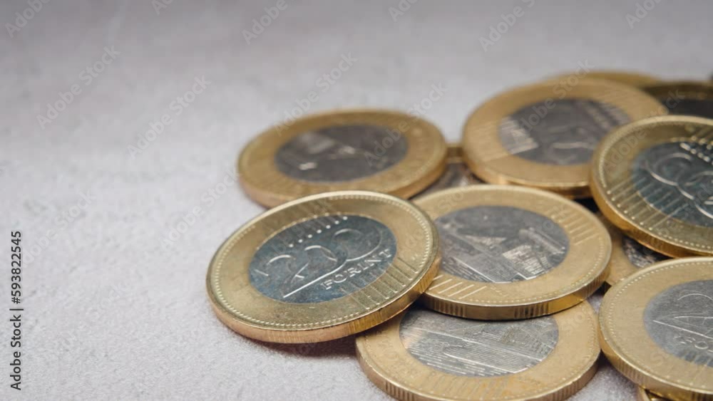 Hungarian forint coins. Two hundred forints closeup macro money shot. Pile of money. Hungarian forint coins. Two hundred forints closeup macro money shot. Pile of money.