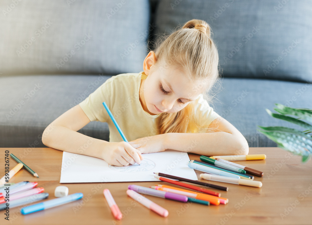 Child girl drawing with colorful pencils Child girl drawing with colorful pencils