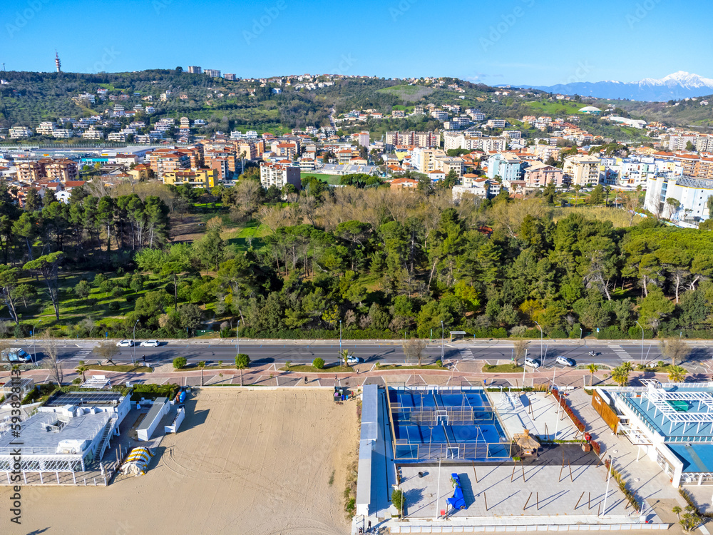 Aerial view landscape Italy Pescara, coast , beach, sea, promenade, buildings and apartments.