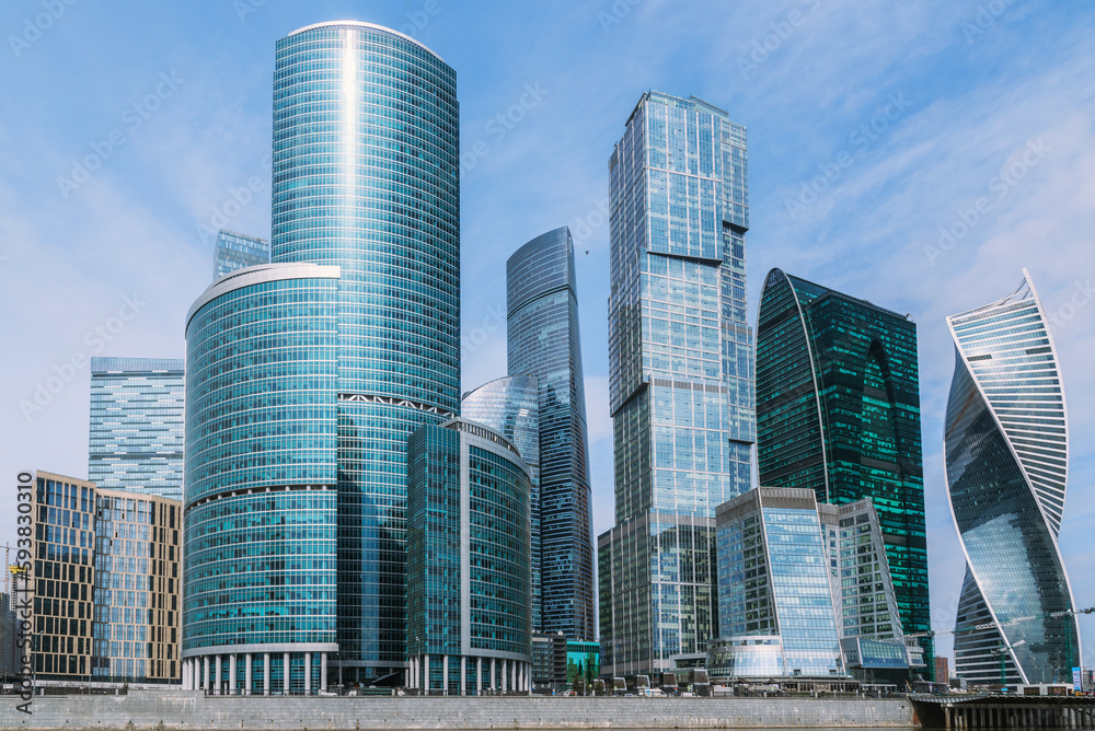 View of Skyscrapers of Moscow City district in sunny day. Moscow. Russia View of Skyscrapers of Moscow City district in sunny day. Moscow. Russia