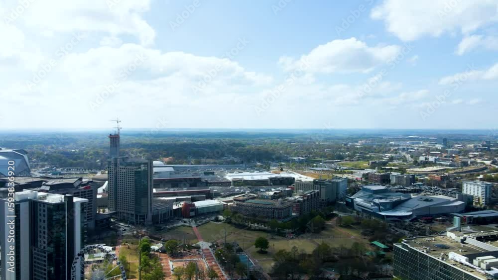 Atlanta, GA USA march 24th 2023: aerial drone footage of Atlanta downtown metropolis area. the skyline is vibrant blue show casing the beautiful metropolises. related to urban travel architecture Atlanta, GA USA march 24th 2023: aerial drone footage of Atlanta downtown metropolis area. the skyline is vibrant blue show casing the beautiful metropolises. related to urban travel architecture