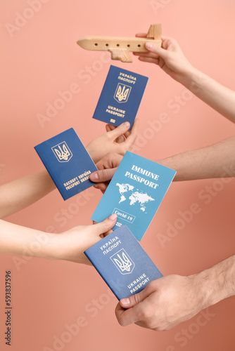 Women holding Ukrainian and...