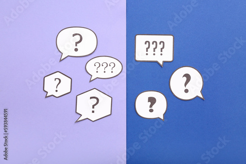 Speech bubbles with question marks on color background