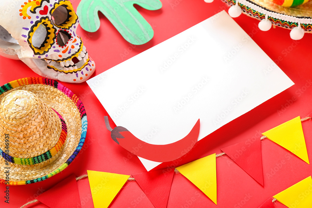 Obraz premium Blank card with Mexican symbols on red background, closeup