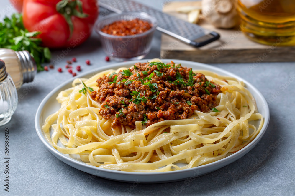 Spaghetti with minced meat in tomato sauce, pasta with noodles. Turkish noodle pasta. Turkish name; Eriste makarna