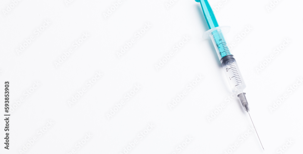 Disposable plastic syringe prepared for injection and vaccination in the hospital. The concept of medicine and health Disposable plastic syringe prepared for injection and vaccination in the hospital. The concept of medicine and health