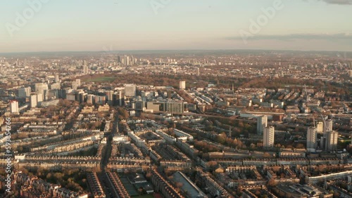 Circling aerial shot over Paddington area West London at sunset photo