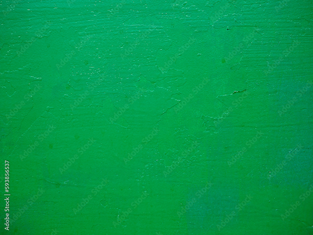 Obraz premium Green background texture. Rough surface painted with green paint