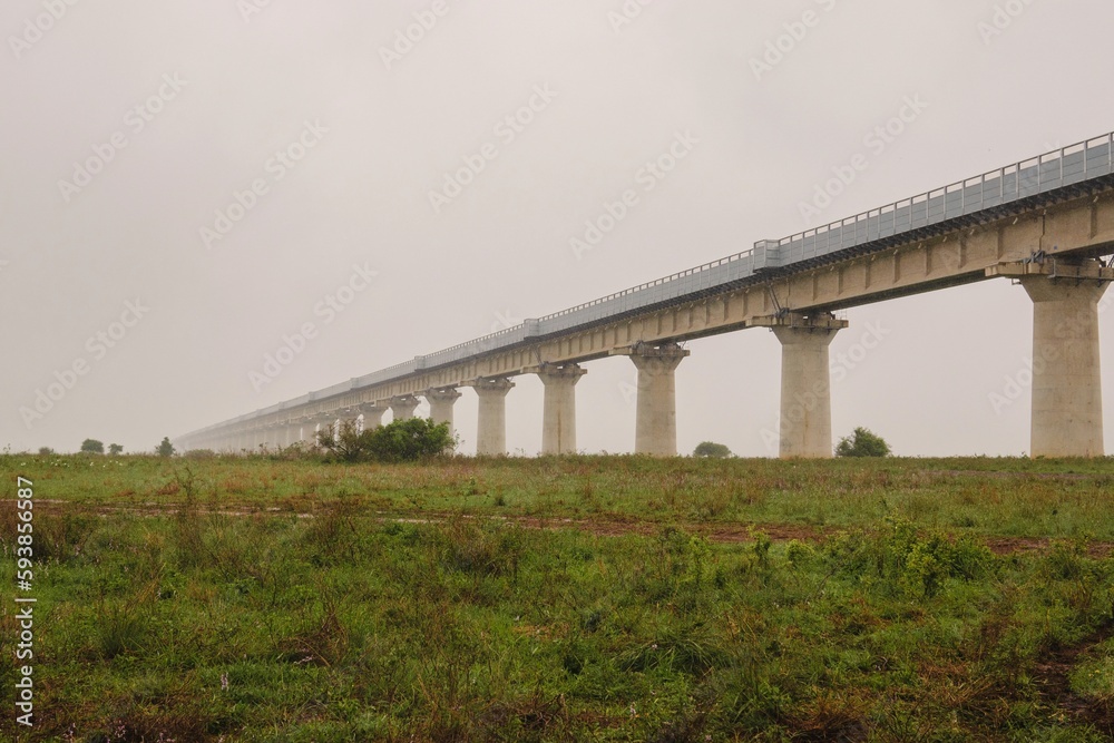 Fototapeta premium Scenic view of Nairobi Mombasa Standard Gauge Railway line seen from Nairobi National Park, Kenya