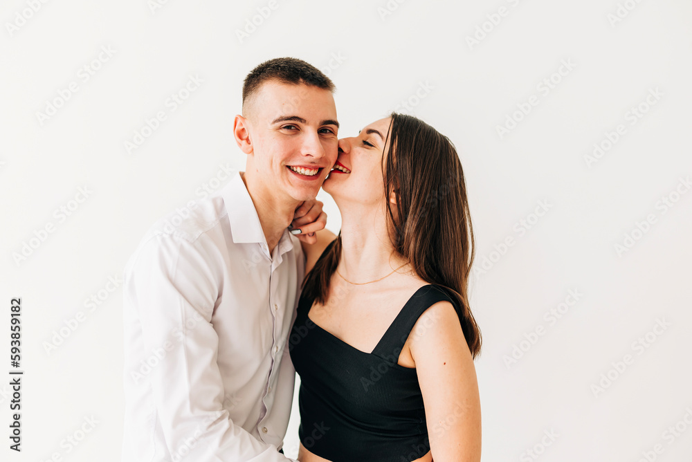 Couple young woman and man kissing lifestyle emotional portrait Couple young woman and man kissing lifestyle emotional portrait