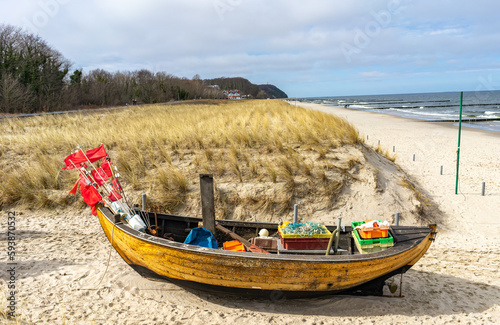 Fototapeta Naklejka Na Ścianę i Meble -  fishing boat on the beach baltic sea
