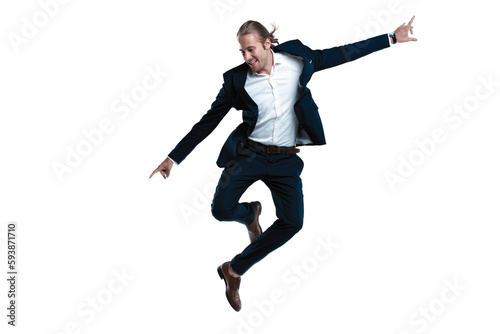 Young successful businessman in suit rejoicing, jumping over transparent background