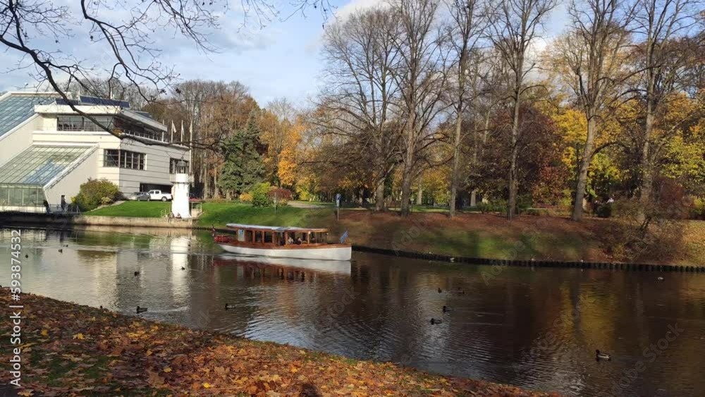 Autumn landscape with a calm pond in Riga, Latvia. 