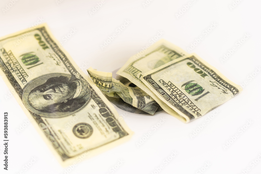 Cleaning a dirty American one hundred dollar bill. money on the black market. Banknotes of 100 dollars in the hands of men near water jets in washbasin Cleaning a dirty American one hundred dollar bill. money on the black market. Banknotes of 100 dollars in the hands of men near water jets in washbasin
