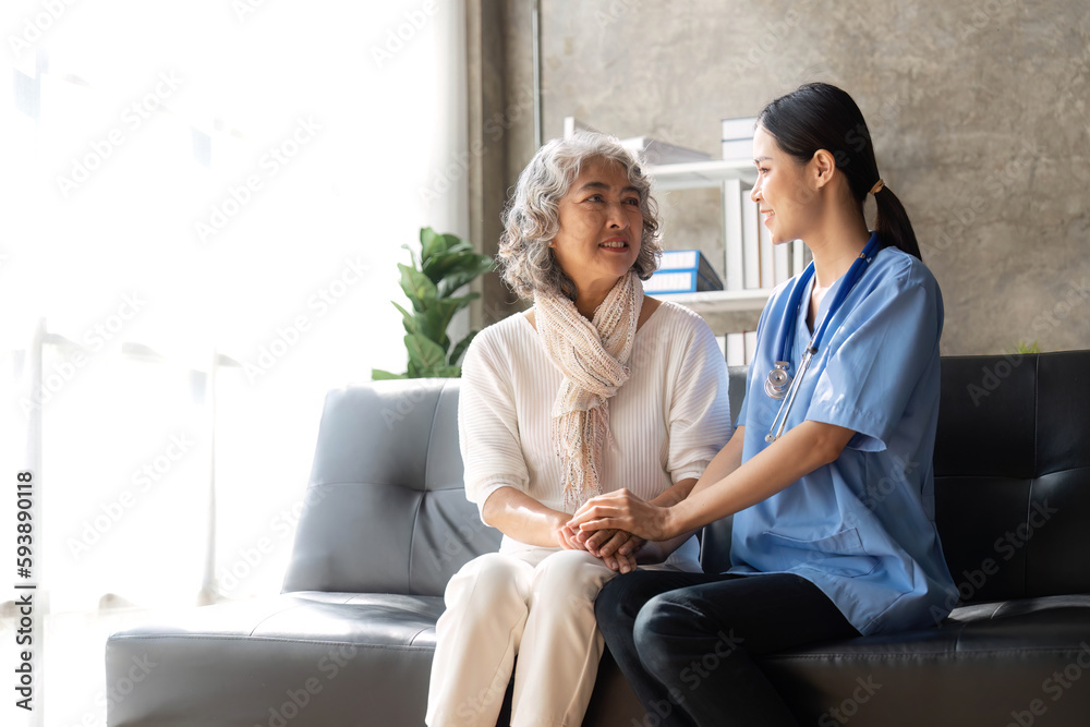 Asian senior female patient consult with physician nurse at nursing home Asian senior female patient consult with physician nurse at nursing home