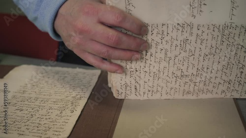 Man working in USA Archives Letters and Historic Clasified Documents Leak Security Intelligence photo