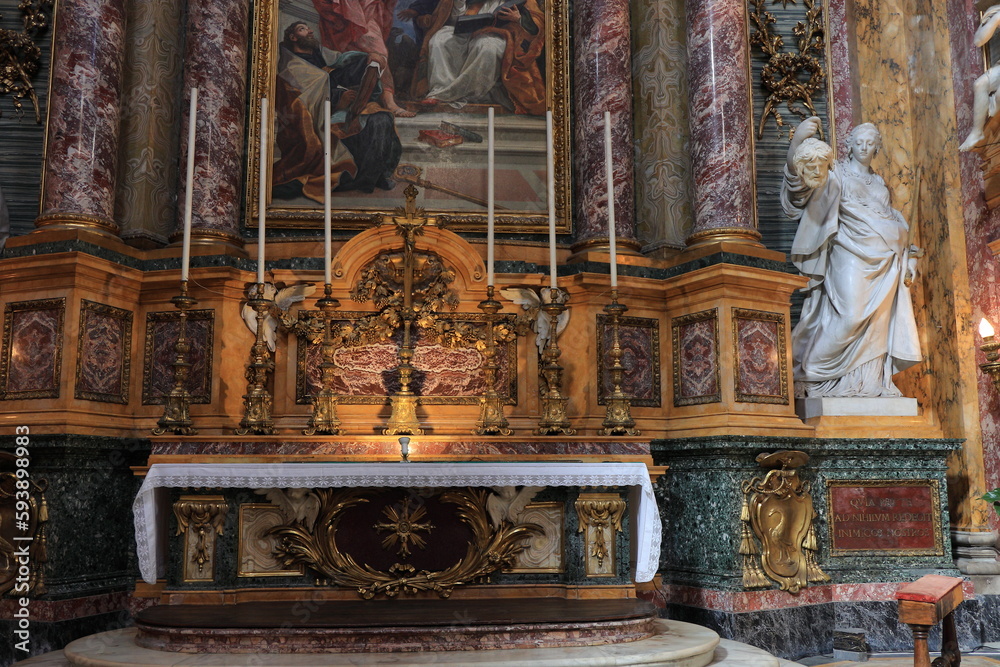 Santi Ambrogio e Carlo al Corso Altar View with Statue in Rome, Italy
