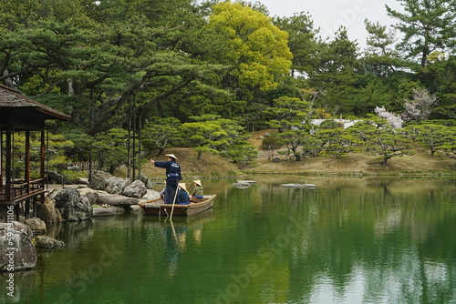 Traditional Japanese Boat on Pond and Japanese Garden at Ritsurin Garden Park in Takamatsu, Kagawa, Japan - 日本 香川 高松 栗林公園 日本庭園 池 和船