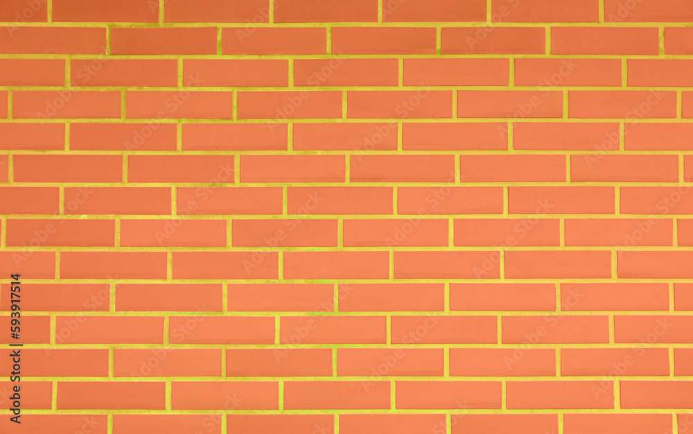 Texture of bright orange brick wall as background Texture of bright orange brick wall as background