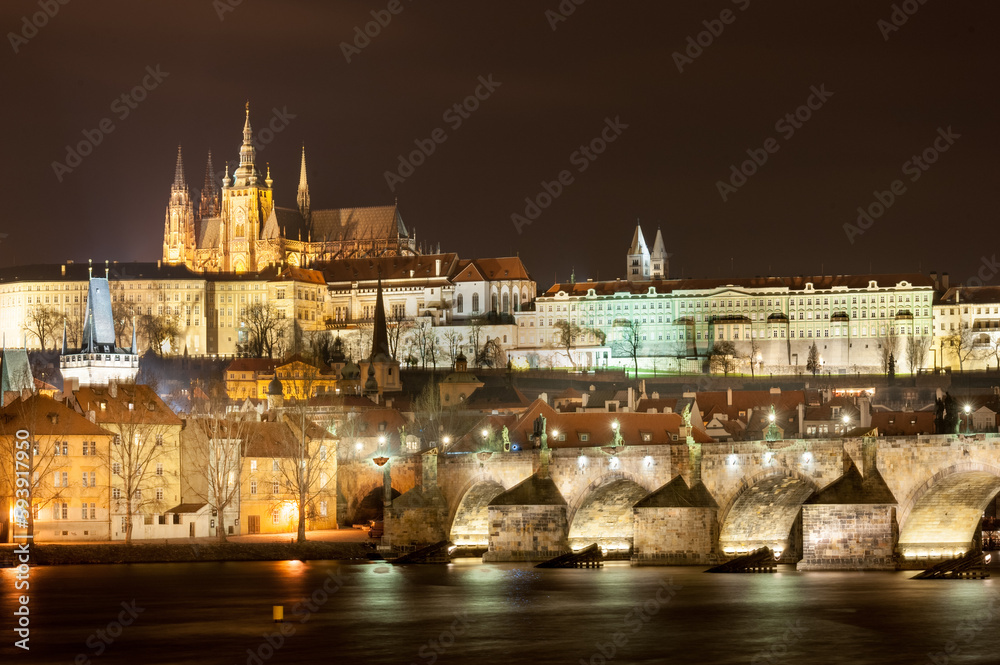 Night Cityscape of Prague, Czech. St. Vitus Cathedral, Castle and Palace in Background. Vltava river. Charles Karluv Bridge. Long Exposure.