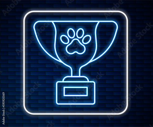 Glowing neon line Pet award symbol icon isolated on brick wall background. Medal with dog footprint as pets exhibition winner concept. Vector