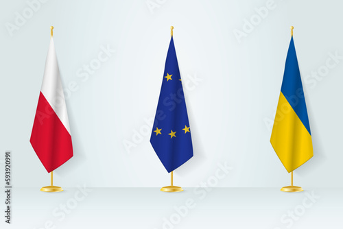Political gathering of governments. Flags of Poland, European Union and Ukraine.