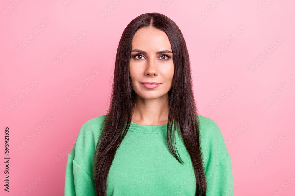 Photo of gorgeous confident nice woman with straight hairdo dressed green sweatshirt look at camera isolated on pink color background Photo of gorgeous confident nice woman with straight hairdo dressed green sweatshirt look at camera isolated on pink color background