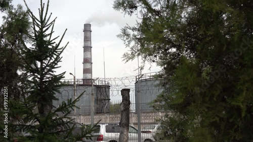 Almaty, Kazakhstan - 04.17.2023 : The pipe of the old thermal power plant of the city. photo