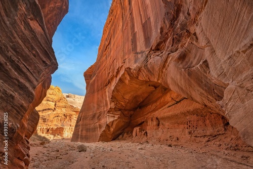 Narrow crevasse filled with bright red-colored rocks, Utah Canyons