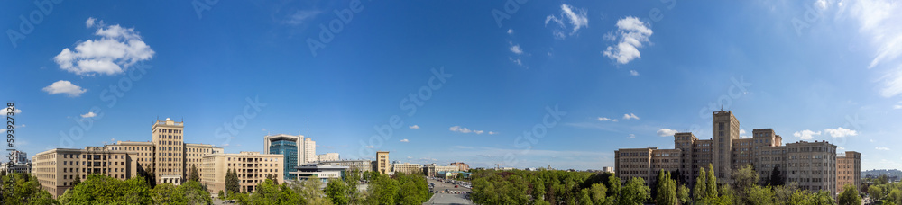 Aerial view on Karazin National University buildings on Freedom Square with spring greenery in Kharkiv, Ukraine