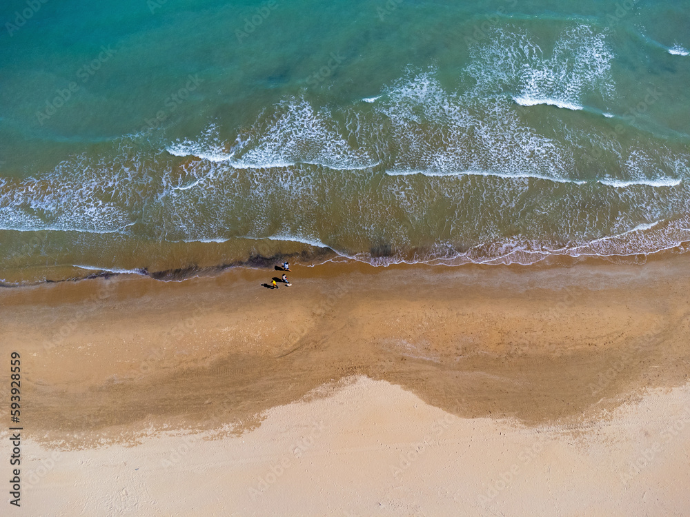 Aerial view landscape Italy Pescara. Empty beach and sea, waves, sand. Photo from a drone.