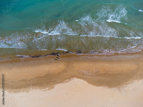 Obraz na płótnie Aerial view landscape Italy Pescara. Empty beach and sea, waves, sand. Photo from a drone. w salonie