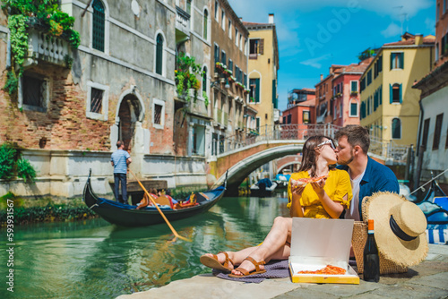 couple having date at pier with beautiful view of venice canal © phpetrunina14
