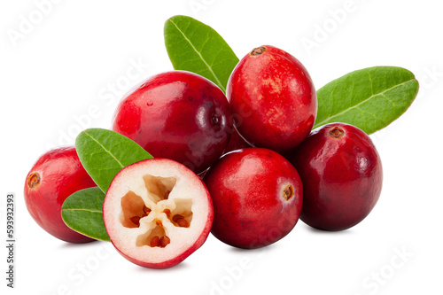 fresh cranberries with green leaves isolated on white background. photo