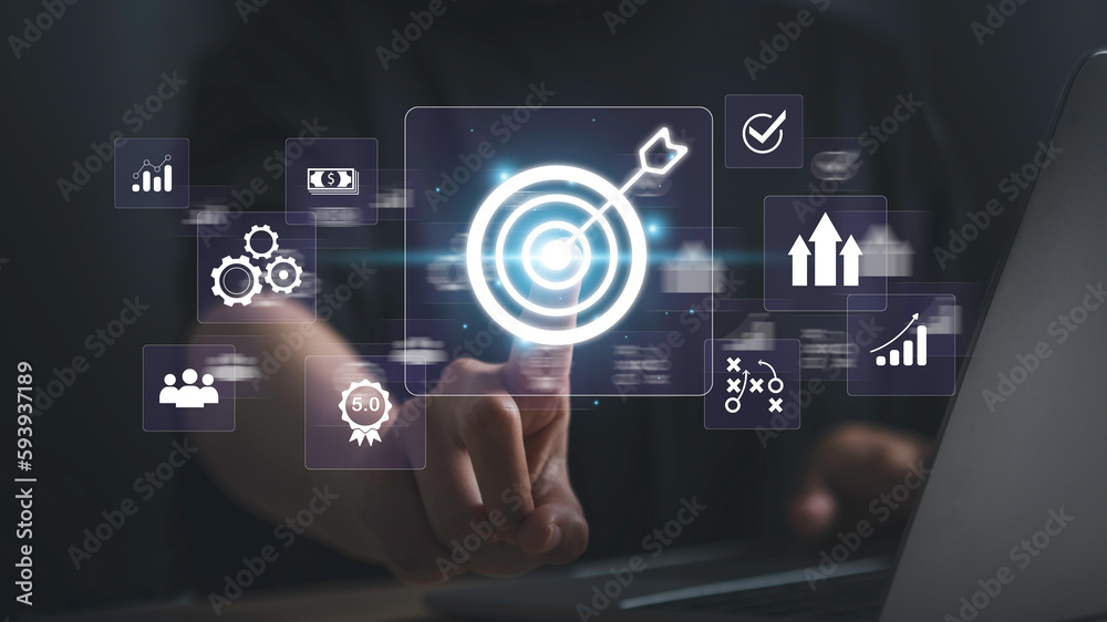Business targeting concept. Businessman touching darts aiming at target center with digital marketing icons on virtual screen internet network connection, Business goal, Digital online marketing. Business targeting concept. Businessman touching darts aiming at target center with digital marketing icons on virtual screen internet network connection, Business goal, Digital online marketing.