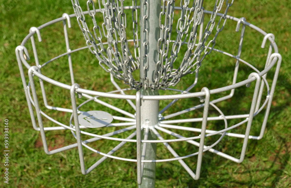 Disc Golf basket. Frisbee golf is sport and hobbie in outdoor park