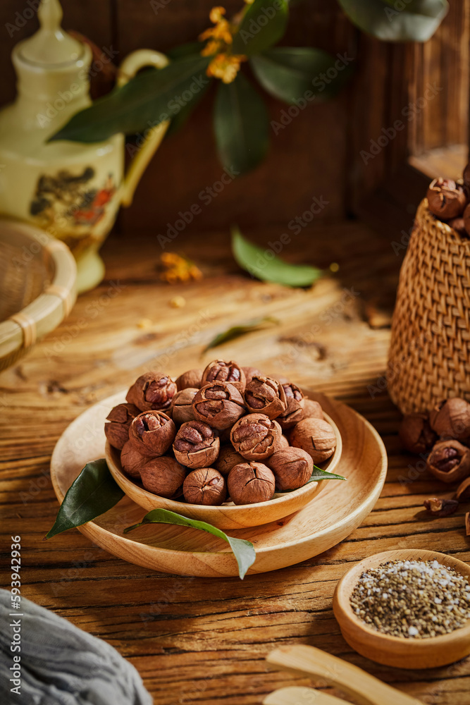 Carya illinoinensis (Wangenh.),Carya cathayensis Sarg,Walnuts are a recreational nut snack with a hard shell Carya illinoinensis (Wangenh.),Carya cathayensis Sarg,Walnuts are a recreational nut snack with a hard shell
