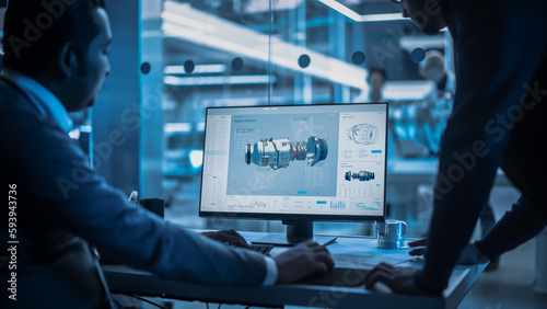 Canvas Print Two Turbine Engine Developers Working on Programming a Prototype Jet Engine on Desktop Computer
