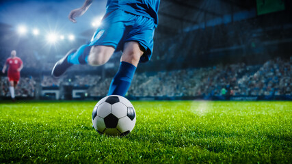 Football World Championship: Soccer Player Runs to Kick the Ball. Ball on the Grass Field of Arena, Full Stadium of Crowd Cheers. International Tournament. Cinematic Shot Captures Victory.