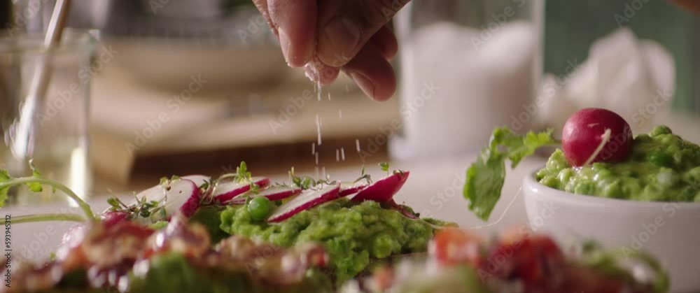 adding some salt to the food