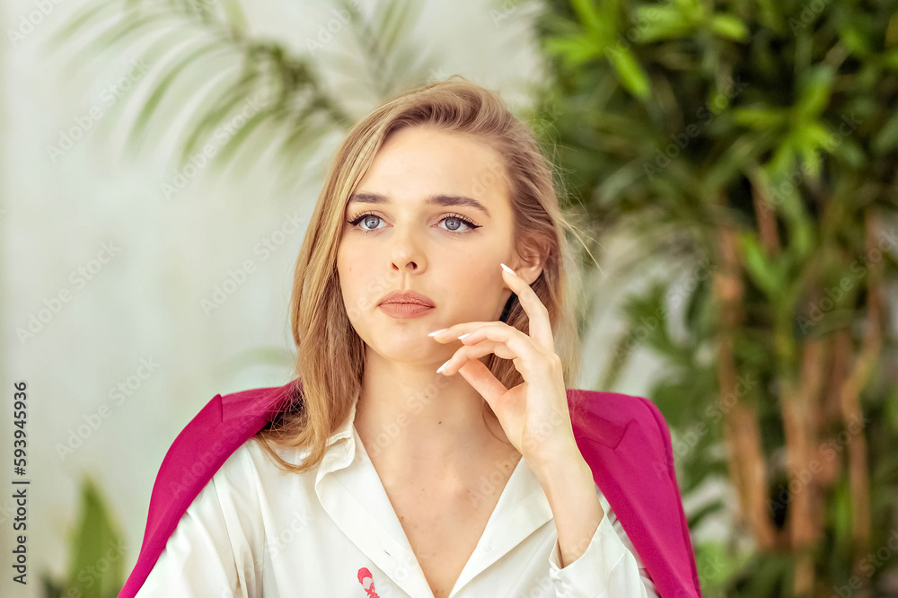 young beautiful college student girl studying busy for university exam worried desperate and in stress feeling tired and test pressure sitting on desk with book in youth education concept
