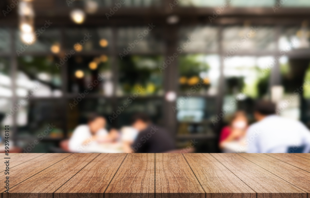 Empty wooden table top with lights bokeh on blur restaurant background. Empty wooden table top with lights bokeh on blur restaurant background.