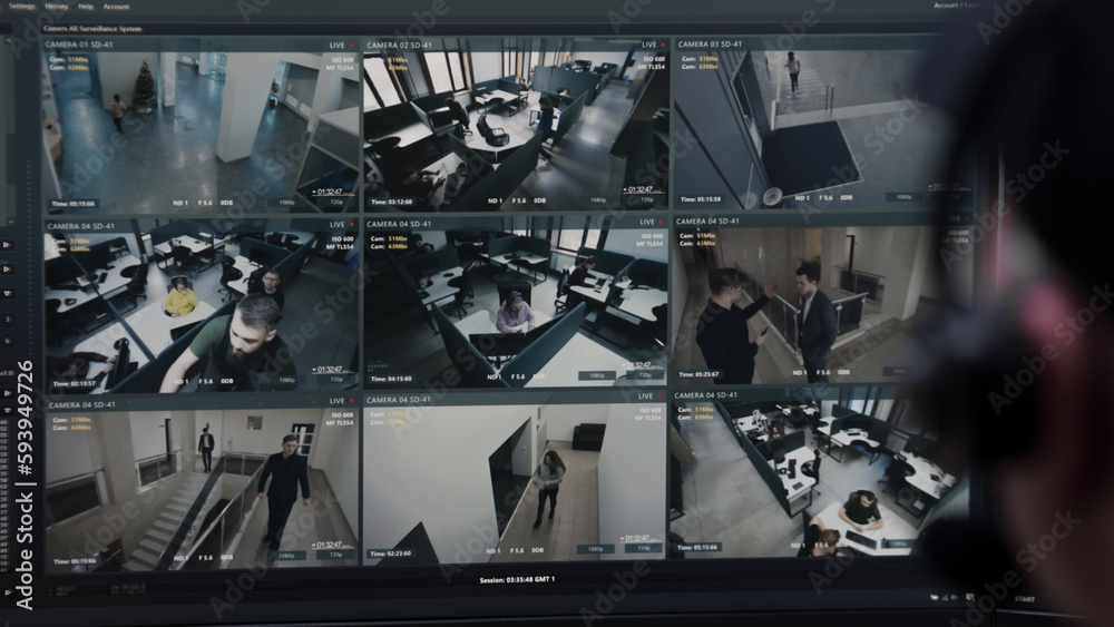 Adobe Security Camera Foto de Security operator controls CCTV cameras in business office ...
