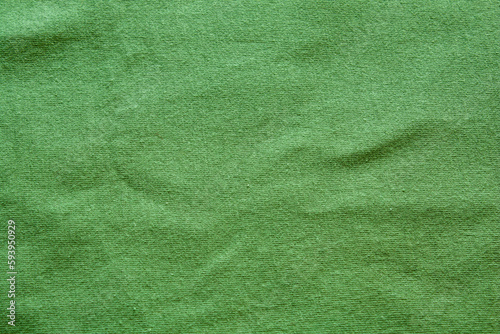 green t-shirt fabric top view
