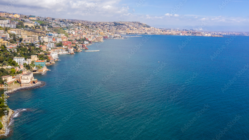 Aerial view of Posillipo waterfront in Naples, Italy. The neighborhood overlooks the Mediterranean Sea.