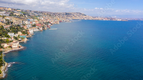 Aerial view of Posillipo waterfront in Naples, Italy. The neighborhood overlooks the Mediterranean Sea.